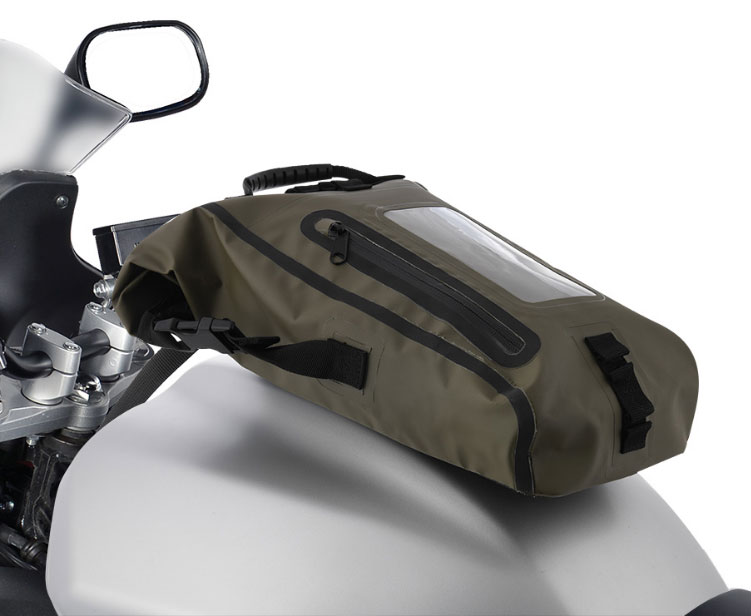 A waterproof Oxford Aqua M8 magnetic tank bag attached to a motorcycle.